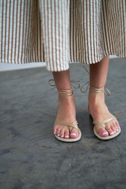 Gold lace-up sandals